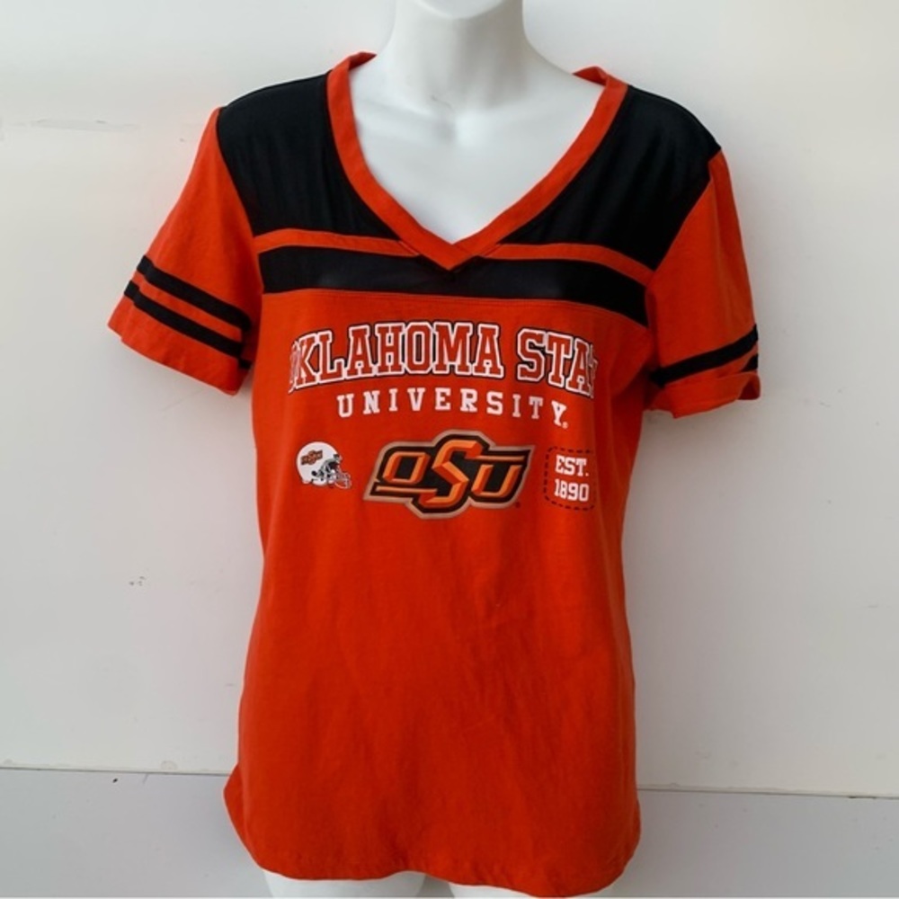 Oklahoma State University Women’s Tee Shirt,‎ XL, bright orange with mesh upper.